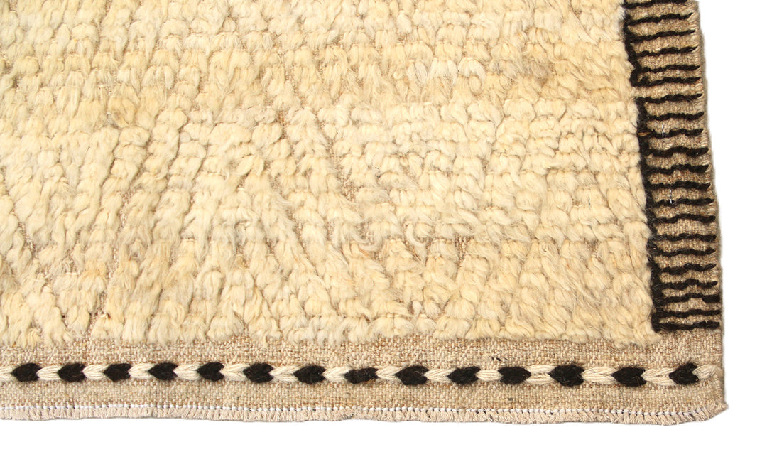Ariana Barchi 9x11 hand-knotted organic undyed wool rug in low shag herringbone pattern inspired by Moroccan Atlas Mountain design