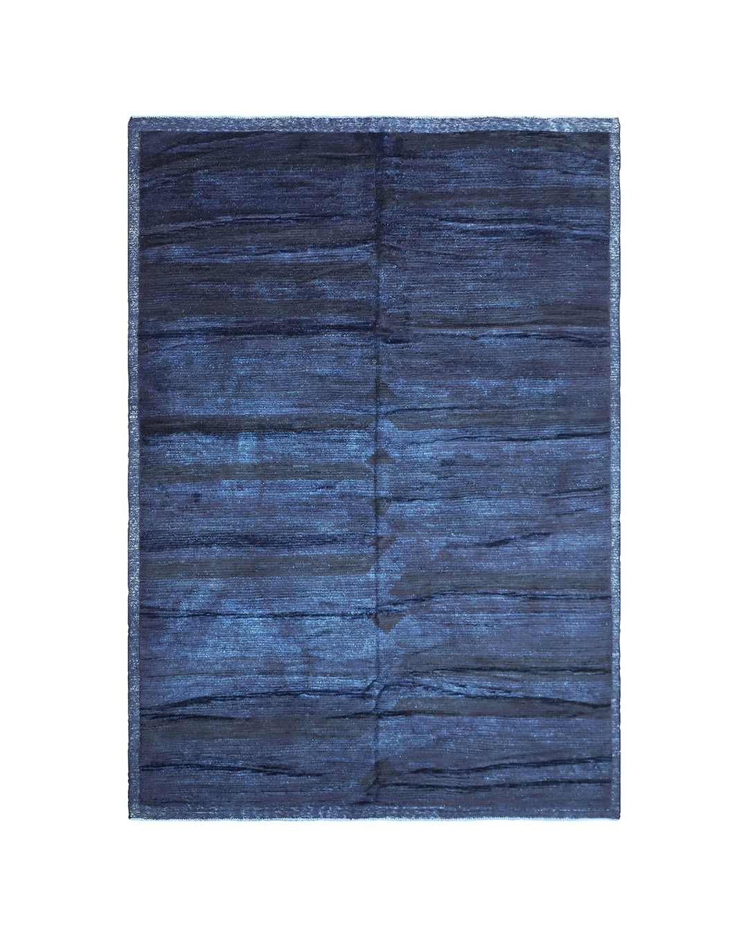 Hand-knotted 6'3" x 9'2" Moroccan-style solid deep blue wool area rug with a rich, soft pile from the Ariana Barchi Collection.