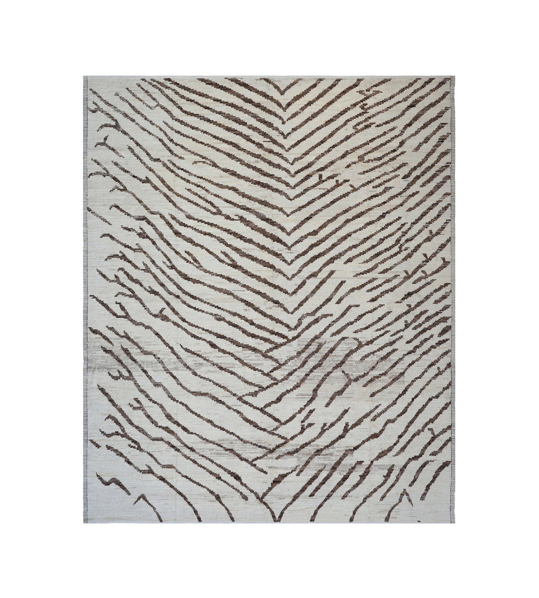 Hand-crafted 15'5" x 12'7" oversized Moroccan-style shag wool on cotton area rug featuring a brown and ivory zebra pattern from the Ariana Barchi Collection.