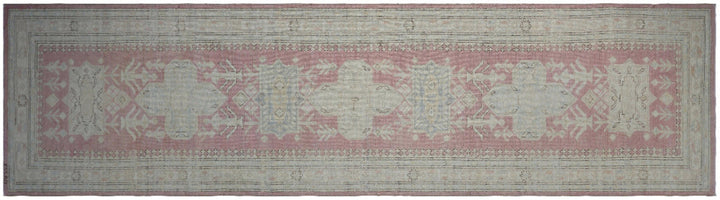 Unique hand-knotted Ariana Hazara Caucasian runner rug with geometric designs in pink, ivory, blue, and brown