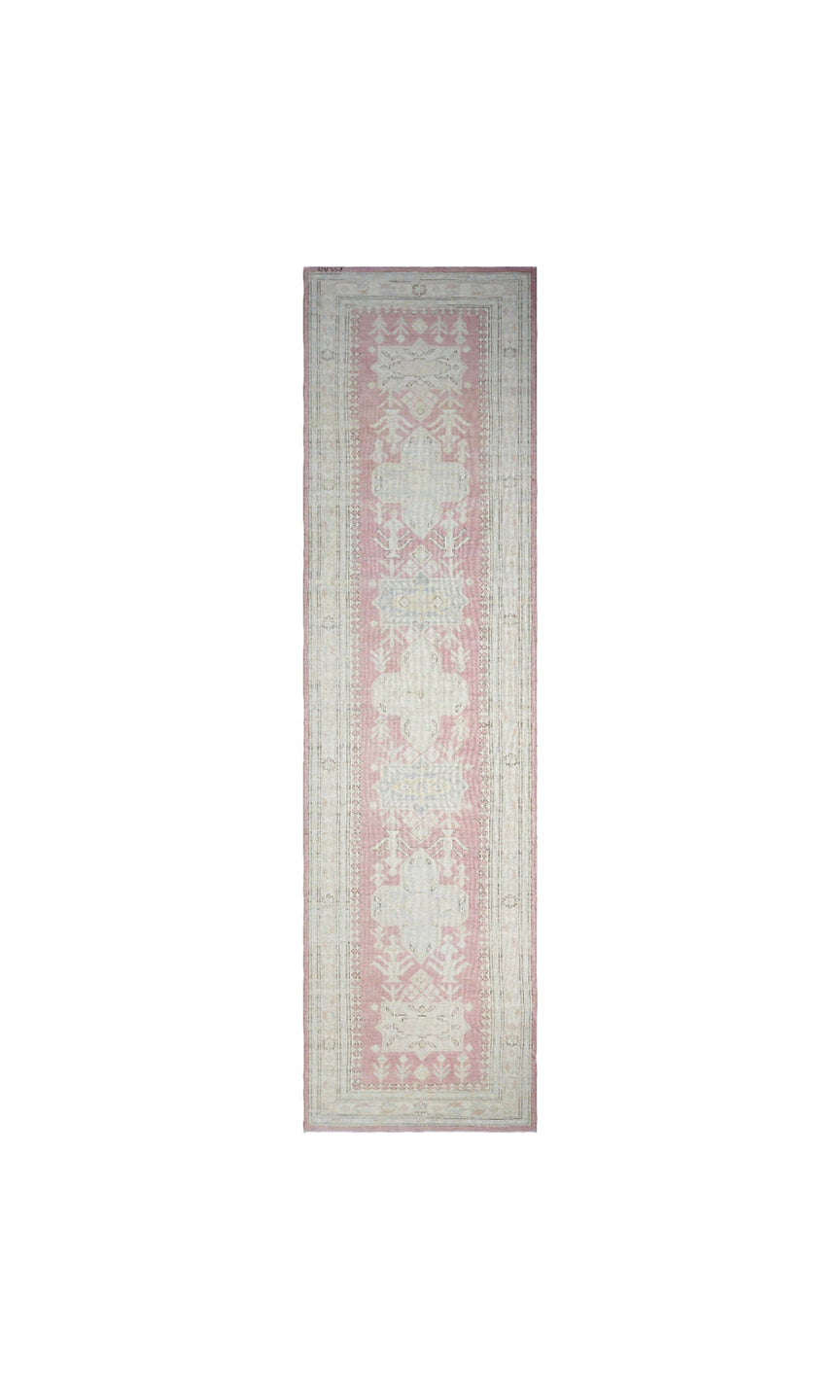 Unique hand-knotted Ariana Hazara Caucasian runner rug with geometric designs in pink, ivory, blue, and brown