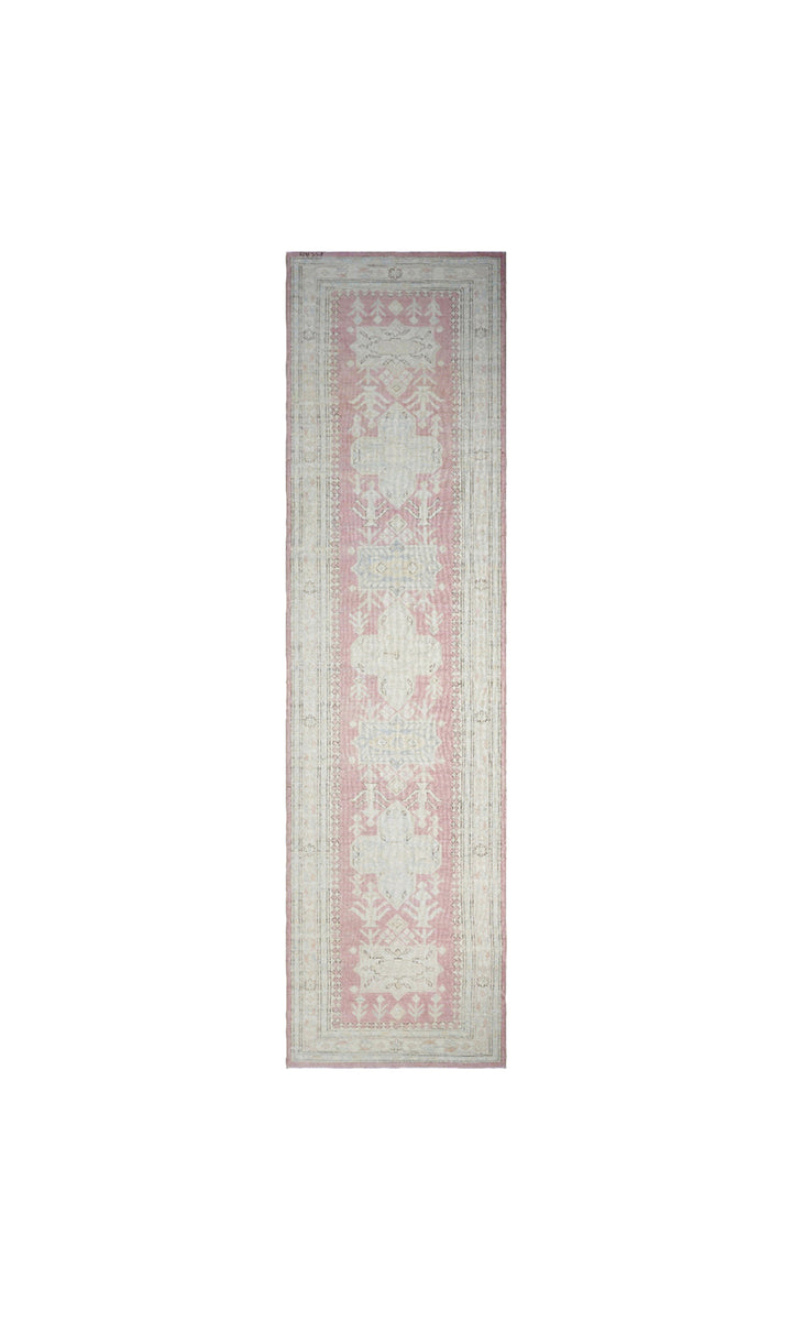 Unique hand-knotted Ariana Hazara Caucasian runner rug with geometric designs in pink, ivory, blue, and brown