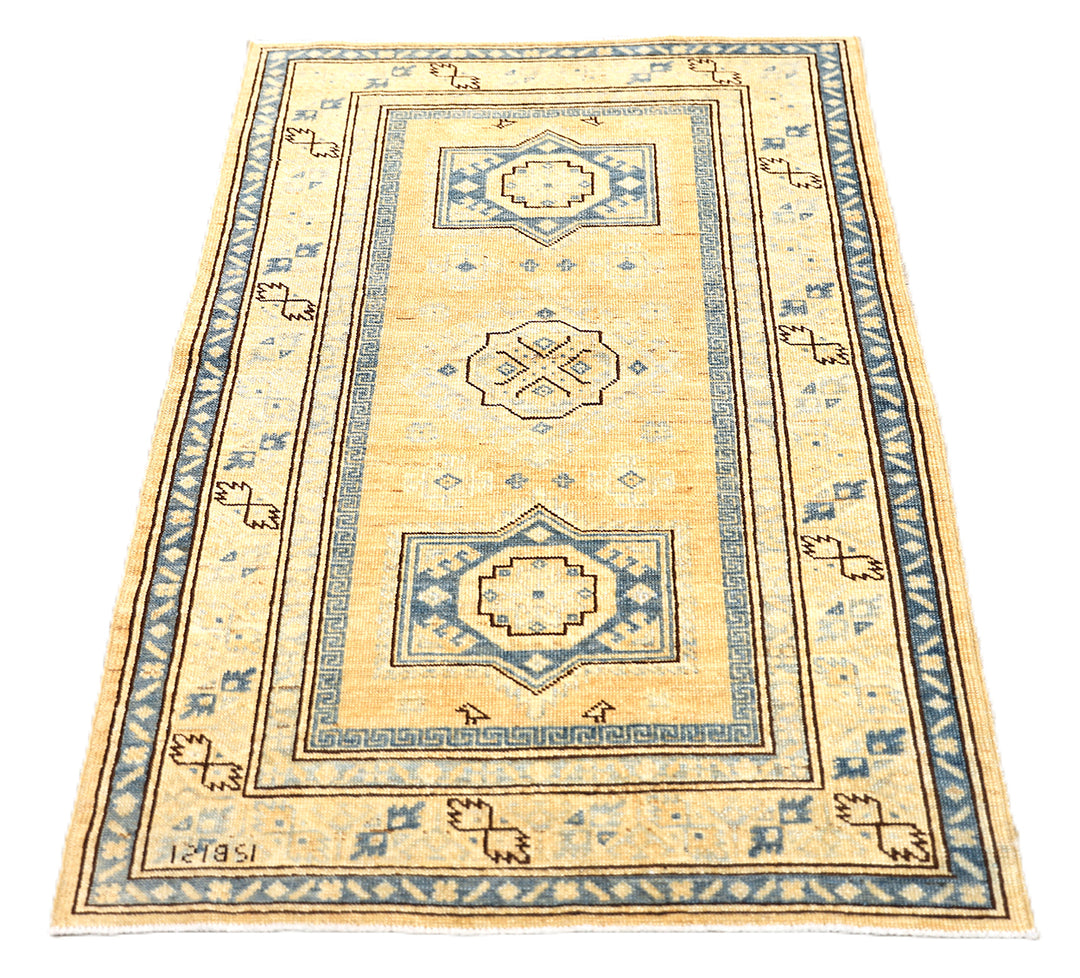 Hand-knotted 2'9"x4'2" Ariana Hazara rug featuring blue geometric medallions on an apricot background