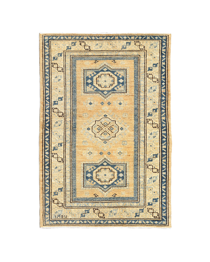Hand-knotted 2'9"x4'2" Ariana Hazara rug featuring blue geometric medallions on an apricot background