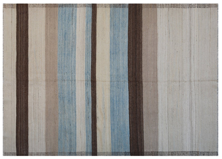 5x7 Ariana Kilim hand-woven Afghan wool rug with blue, white, camel, and brown stripes, full overhead view.