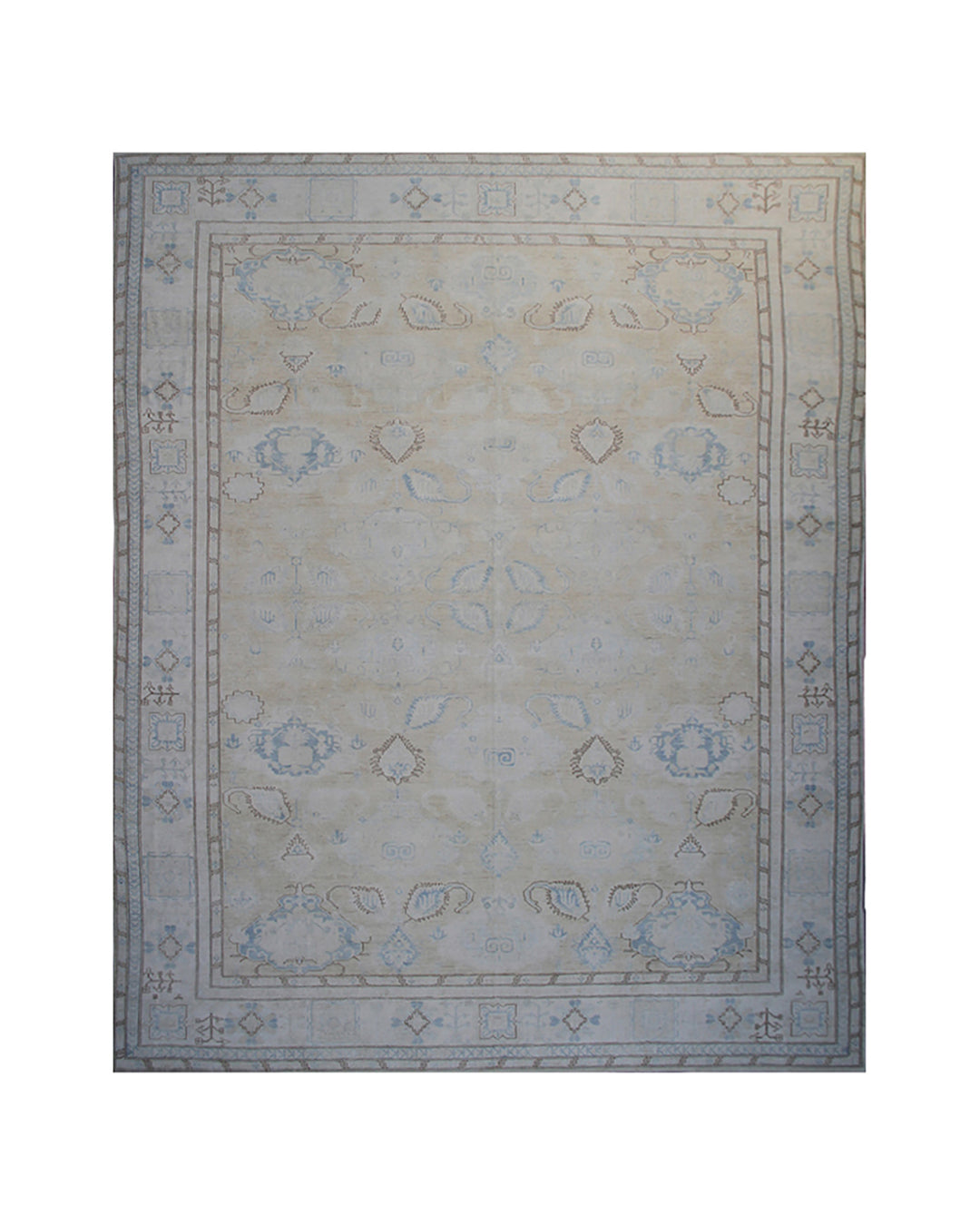 Ariana large Caucasian design wool rug in ivory and pale blue, hand-knotted in Afghanistan by Hazara artisans. Luxury oversized geometric area rug for elegant interiors.