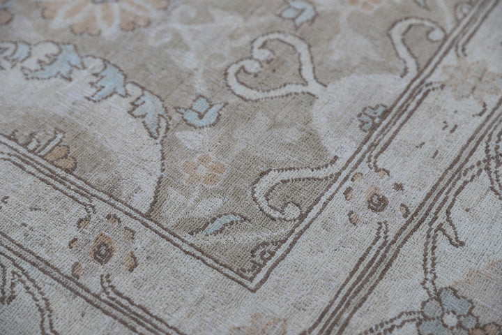 Oversized 11x15 Ariana Luxury hand-knotted Afghan wool and silk rug with Persian pattern in soft gold, blue, and ivory, full view.