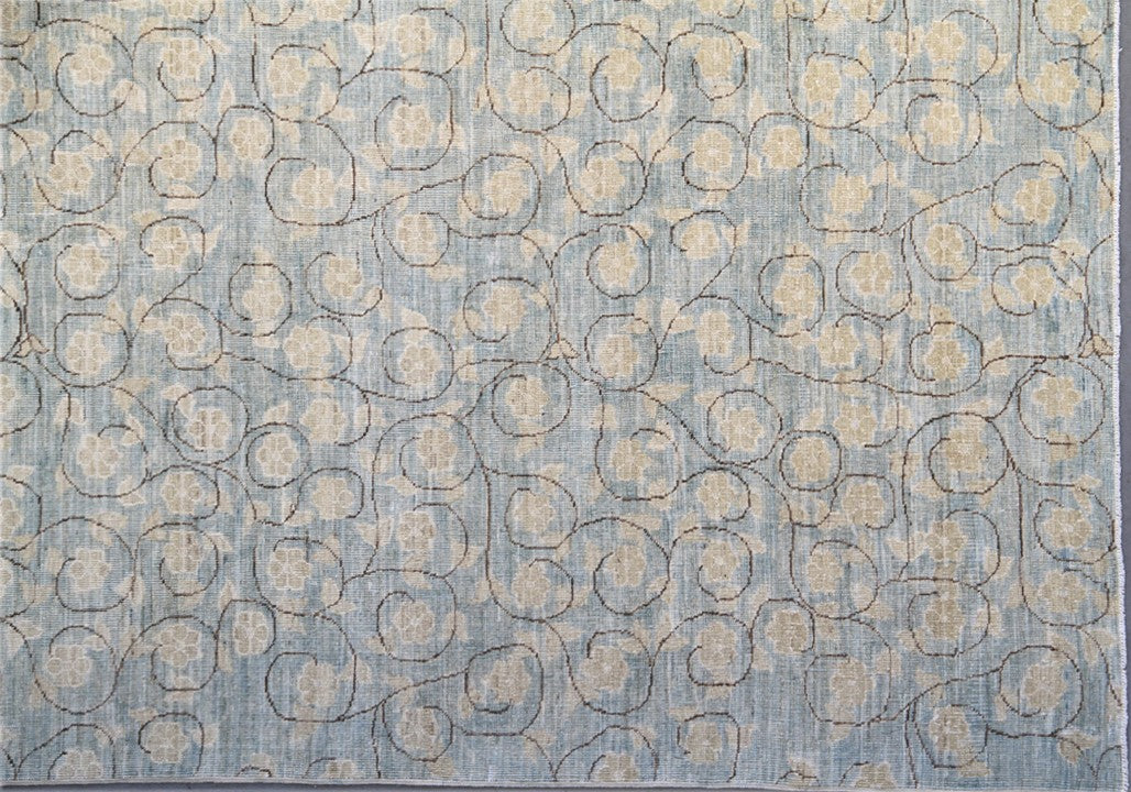 Hand-knotted 10x13 Ariana modern rug featuring an intricate European floral millefleur pattern in blue and cream