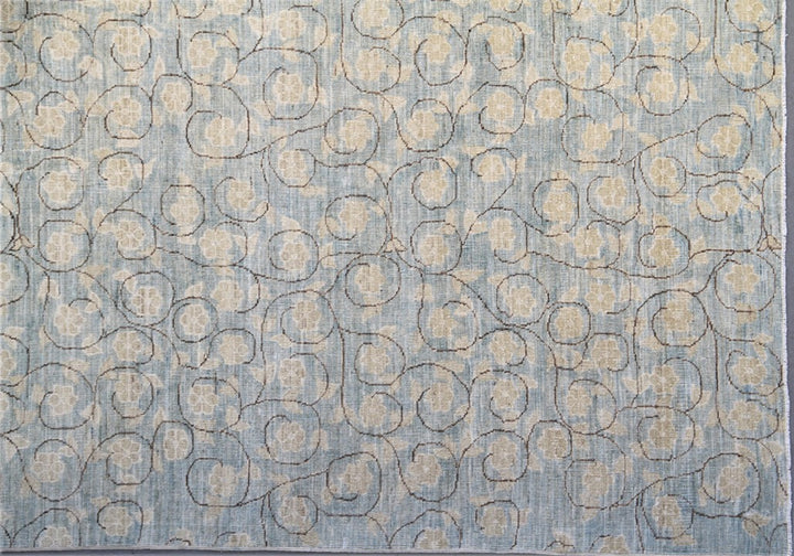 Hand-knotted 10x13 Ariana modern rug featuring an intricate European floral millefleur pattern in blue and cream