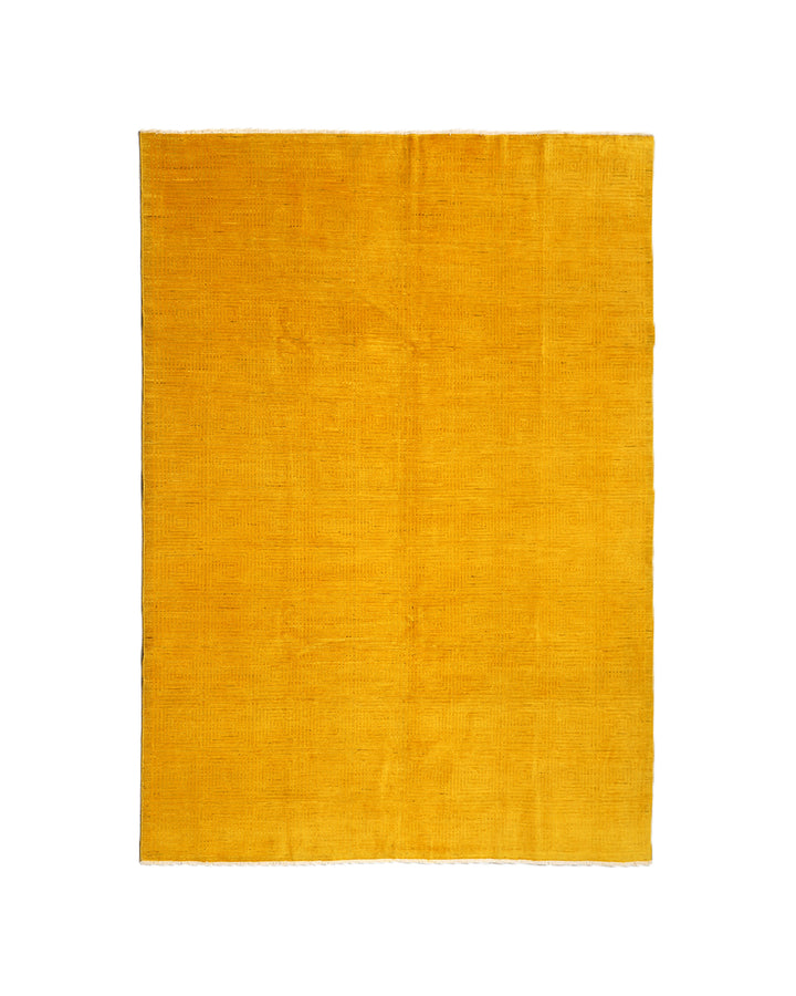 7'x9'9" hand-knotted yellow geometric Ariana overdyed wool rug featuring subtle artisan details and vibrant yellow tones