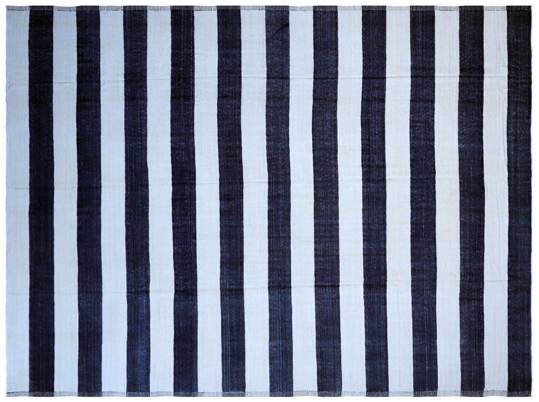 Ariana Rugs 12'x17' handwoven navy and white striped wool kilim area rug featuring a clean flatweave construction on a cotton foundation.