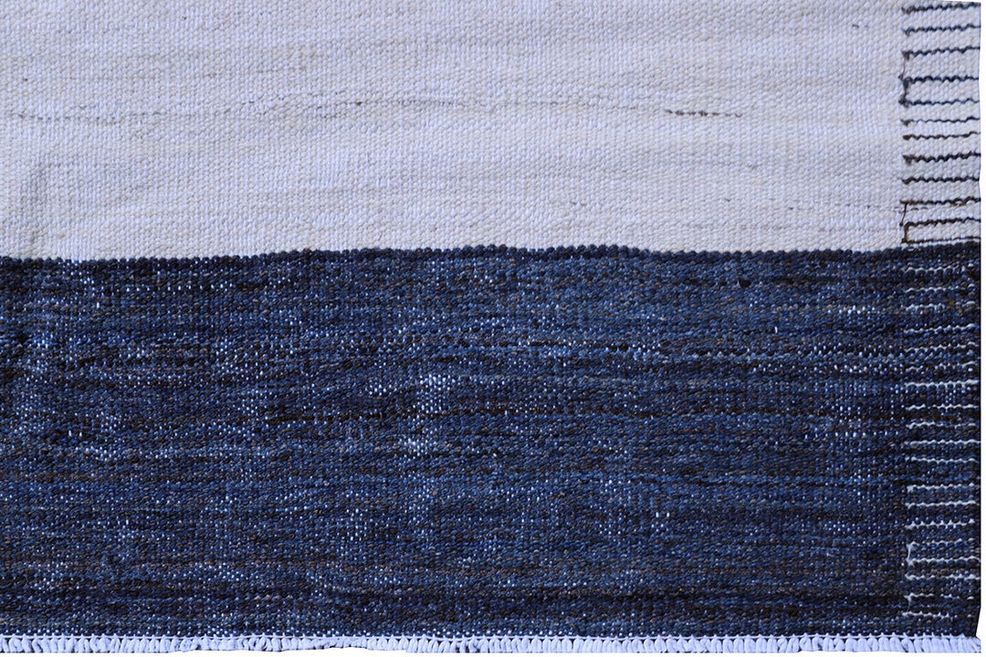 Ariana Rugs 12'x17' handwoven navy and white striped wool kilim area rug featuring a clean flatweave construction on a cotton foundation.