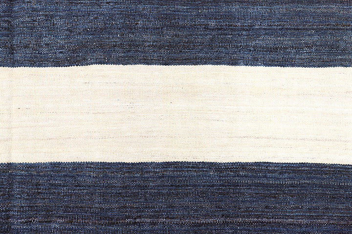 Ariana Rugs 12'x17' handwoven navy and white striped wool kilim area rug featuring a clean flatweave construction on a cotton foundation.