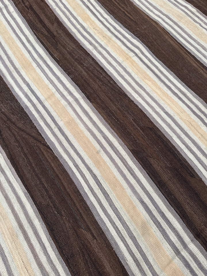 Ariana Rugs 17'x29' oversized handwoven brown and cream striped wool kilim area rug featuring a clean flatweave construction on a cotton foundation.