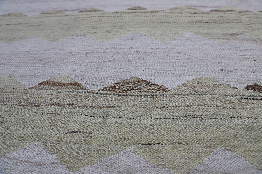 Ariana Rugs 8'x10' handwoven soft green and ivory wave design wool kilim area rug featuring a modern organic flatweave structure on a cotton foundation.