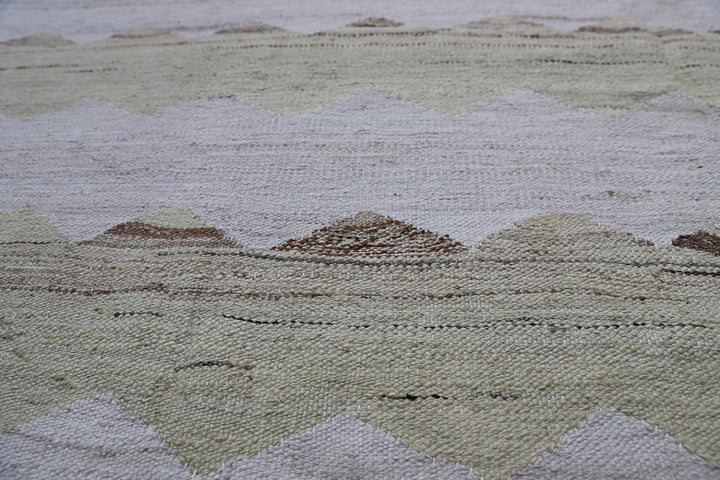 Ariana Rugs 8'x10' handwoven soft green and ivory wave design wool kilim area rug featuring a modern organic flatweave structure on a cotton foundation.
