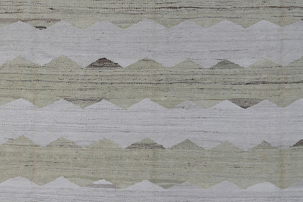 Ariana Rugs 8'x10' handwoven soft green and ivory wave design wool kilim area rug featuring a modern organic flatweave structure on a cotton foundation.