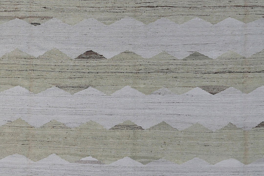 Ariana Rugs 8'x10' handwoven soft green and ivory wave design wool kilim area rug featuring a modern organic flatweave structure on a cotton foundation.