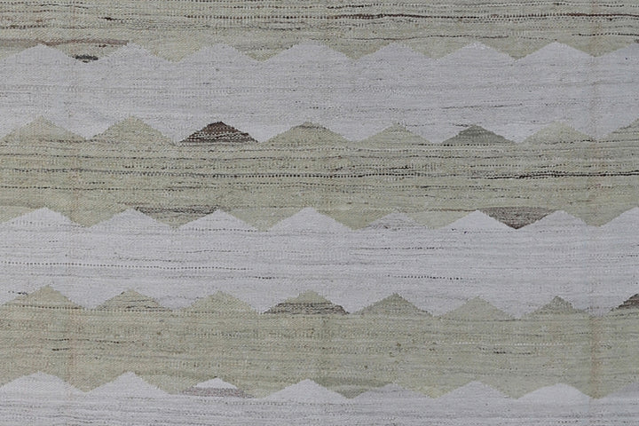 Ariana Rugs 8'x10' handwoven soft green and ivory wave design wool kilim area rug featuring a modern organic flatweave structure on a cotton foundation.
