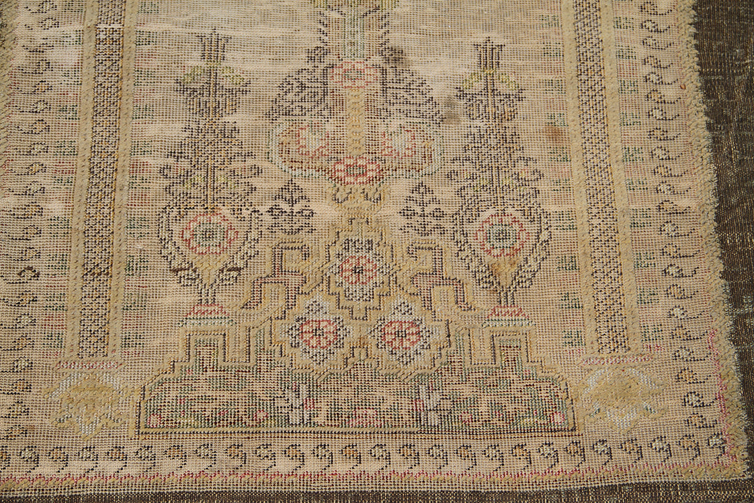Luxury antique Turkish metal embroidered prayer rug in bronze-brown curated by Ariana Rugs West Hollywood for interior designers.