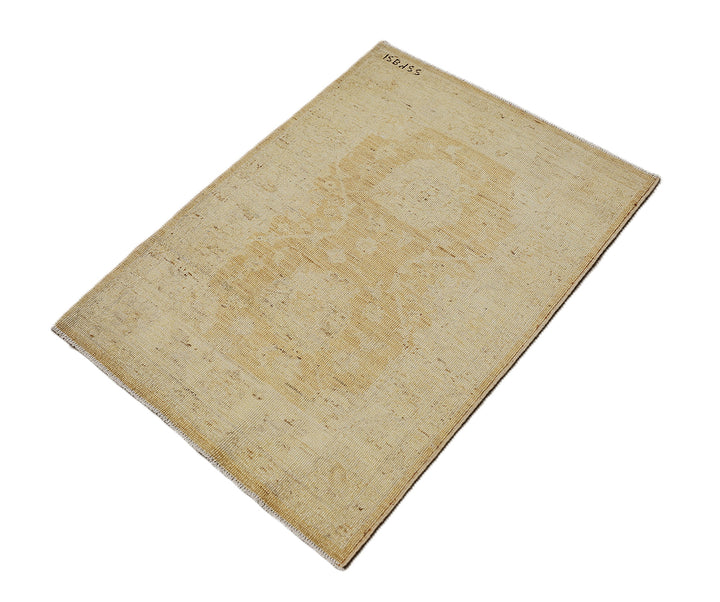 Ariana Rugs 2x3 hand-knotted luxury rug featuring a soft honey washed-out Tabriz design in an Oushak color palette, artisan-crafted by Hazara women weavers.