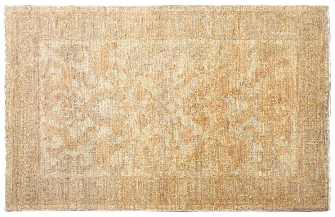 Ariana Rugs hand-knotted 2'10" x 4'4" soft honey traditional Persian floral accent rug, woven in organic wool by Hazara women weavers in Afghanistan.