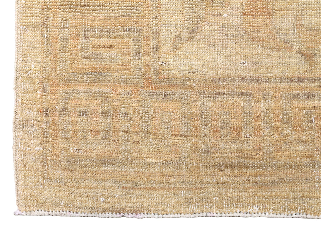 Ariana Rugs hand-knotted 2'10" x 4'4" soft honey traditional Persian floral accent rug, woven in organic wool by Hazara women weavers in Afghanistan.
