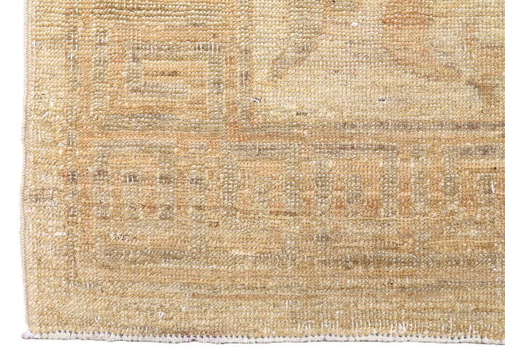 Ariana Rugs hand-knotted 2'10" x 4'4" soft honey traditional Persian floral accent rug, woven in organic wool by Hazara women weavers in Afghanistan.