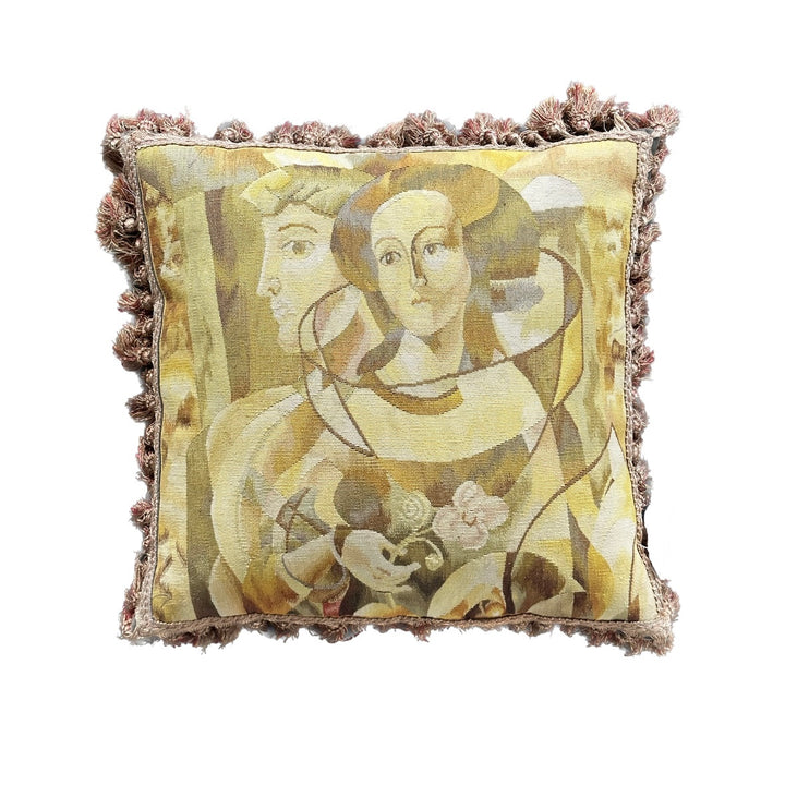Luxury hand-knotted yellow and brown human face Aubusson pillow case with tassels made from organic wool by expert weavers, curated by Ariana Rugs West Hollywood.