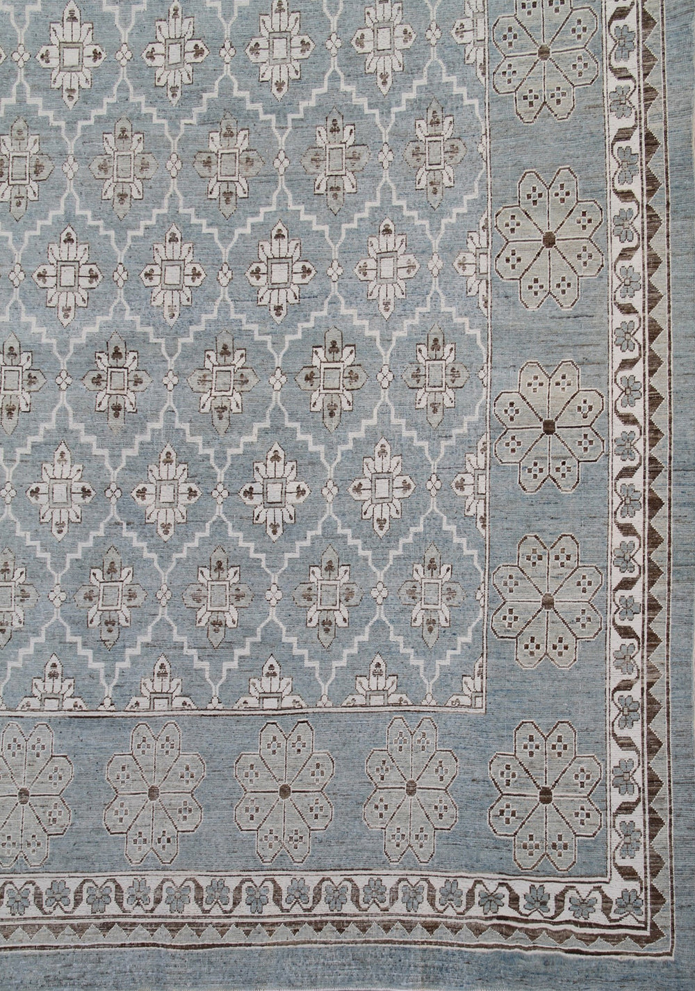 Authentic Ariana Samarkand Collection 9x12 wool area rug featuring a geometric Silk Road design in deep blue and stark white with woven cotton highlights, hand-knotted in Afghanistan.