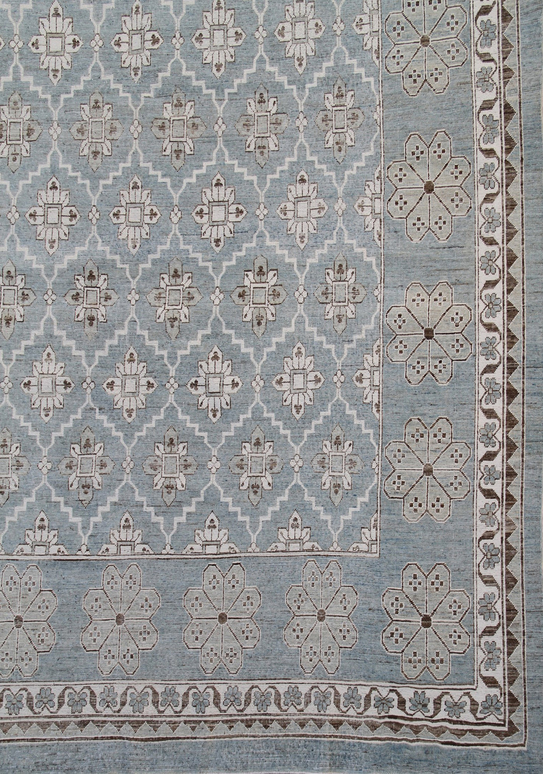 Authentic Ariana Samarkand Collection 9x12 wool area rug featuring a geometric Silk Road design in deep blue and stark white with woven cotton highlights, hand-knotted in Afghanistan.