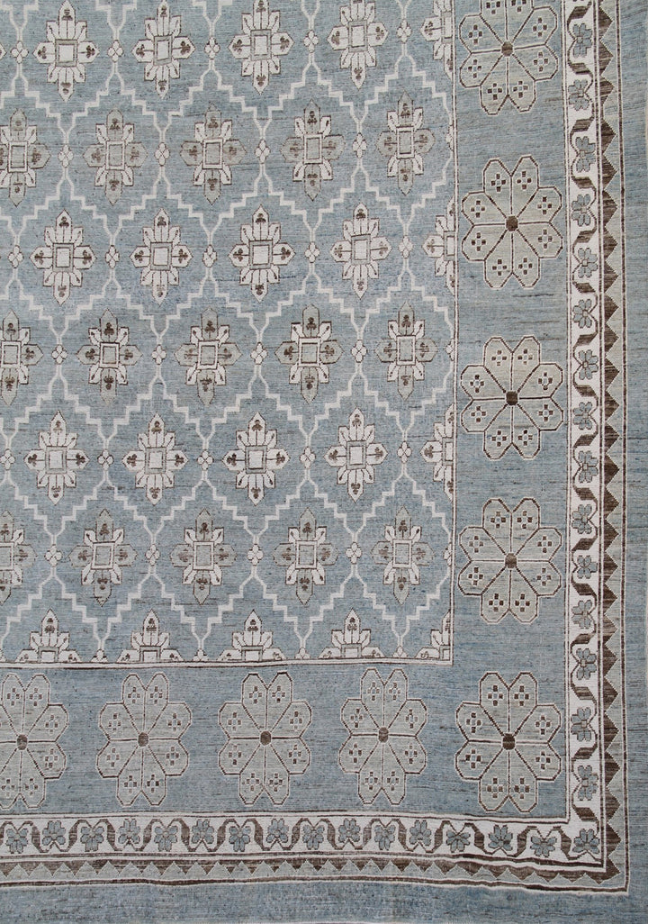 Authentic Ariana Samarkand Collection 9x12 wool area rug featuring a geometric Silk Road design in deep blue and stark white with woven cotton highlights, hand-knotted in Afghanistan.