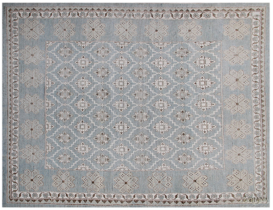 Authentic Ariana Samarkand Collection 9x12 wool area rug featuring a geometric Silk Road design in deep blue and stark white with woven cotton highlights, hand-knotted in Afghanistan.