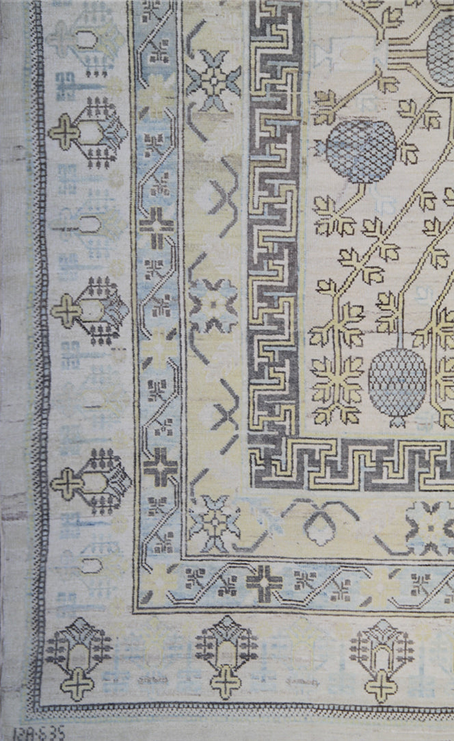 Authentic Ariana Samarkand Collection 10x14 wool area rug featuring a vintage style pomegranate design with geometric borders, ethically hand-knotted in Afghanistan.