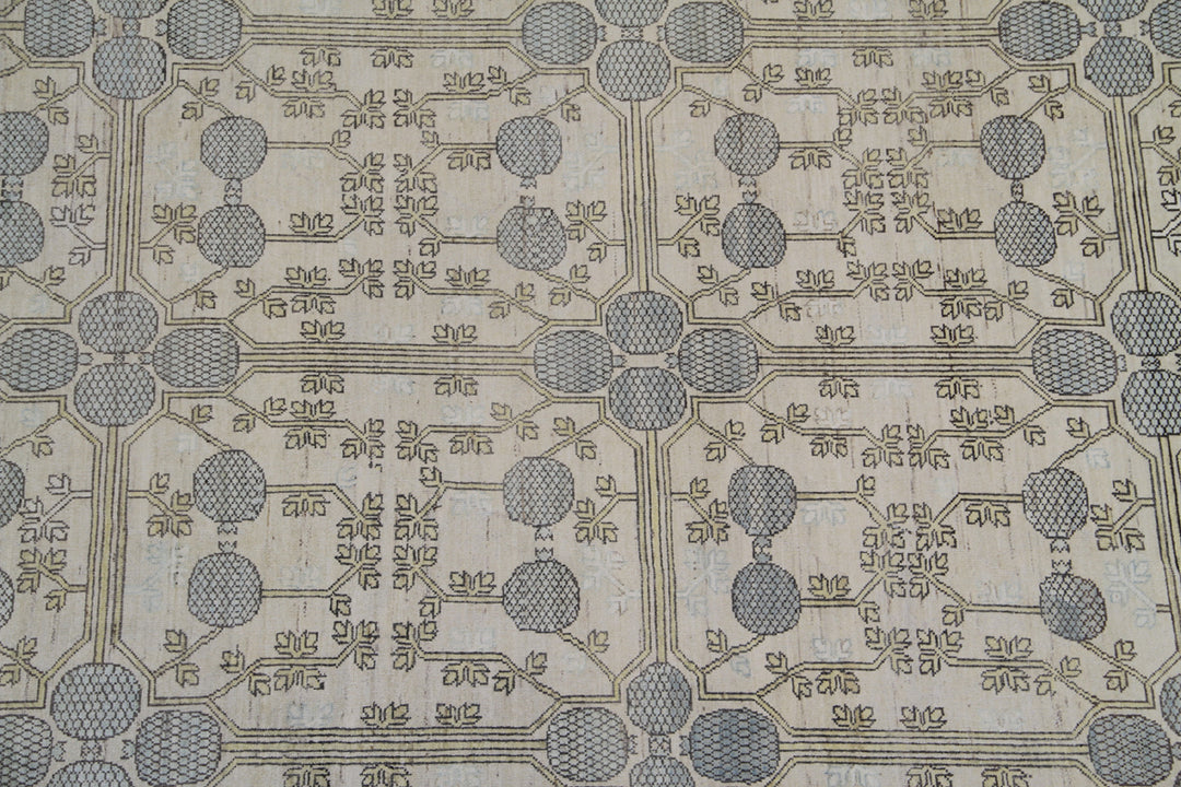 Authentic Ariana Samarkand Collection 10x14 wool area rug featuring a vintage style pomegranate design with geometric borders, ethically hand-knotted in Afghanistan.