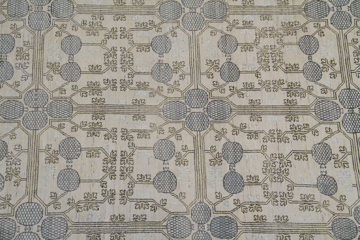 Authentic Ariana Samarkand Collection 10x14 wool area rug featuring a vintage style pomegranate design with geometric borders, ethically hand-knotted in Afghanistan.