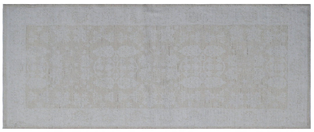 Elevated detail view of an authentic 7'5" x 3'1" Ariana traditional hand-knotted wool runner rug showcasing delicate floral patterns in a soft, elegant color palette.