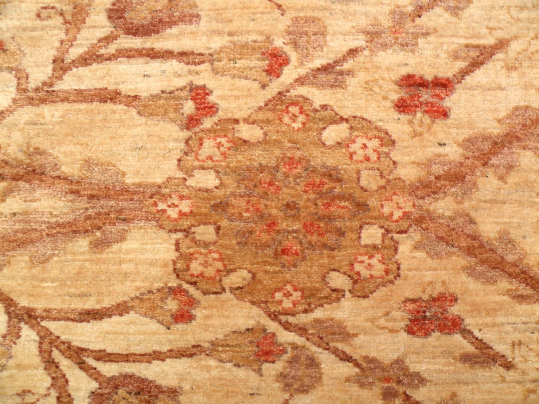 Oversized 14x19 hand-knotted Oushak rug in soft gold and antique tones, featuring floral palmette motifs and crafted from hand-spun Afghan wool by Ariana Rugs.
