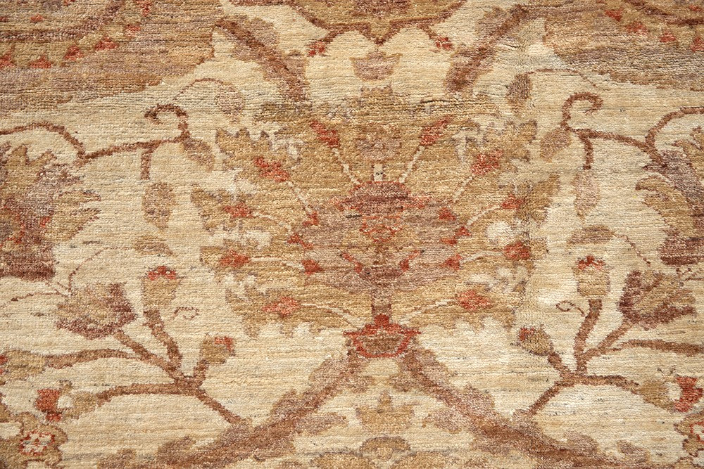 Oversized 14x19 hand-knotted Oushak rug in soft gold and antique tones, featuring floral palmette motifs and crafted from hand-spun Afghan wool by Ariana Rugs.