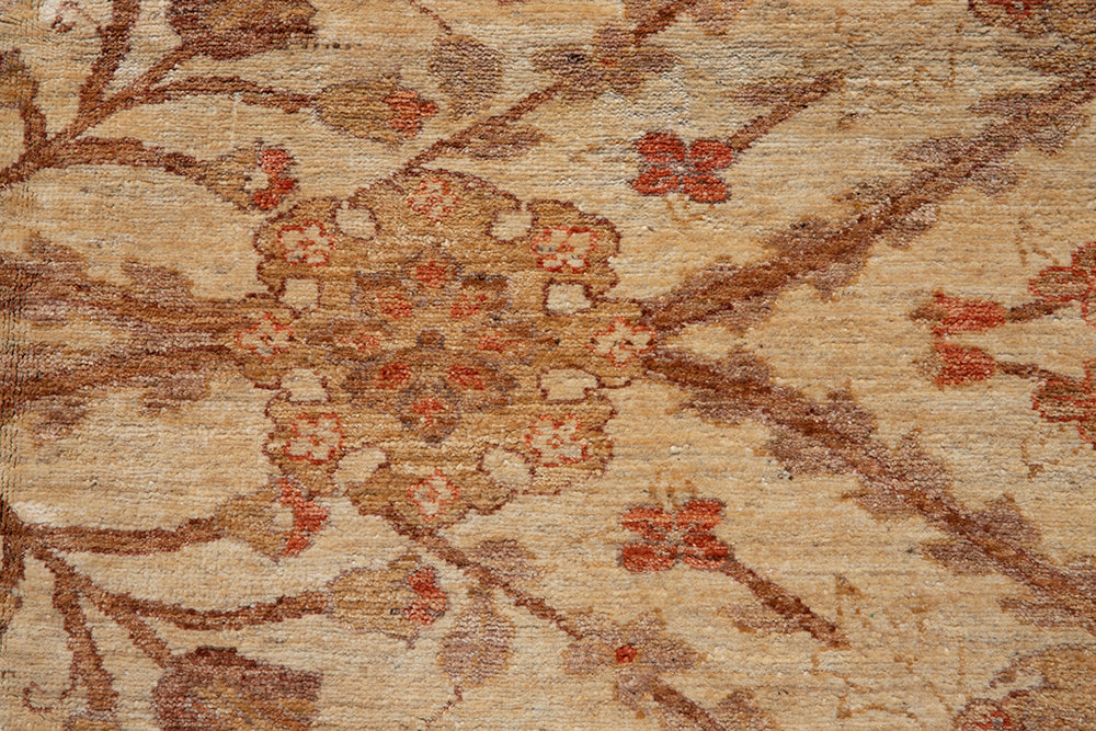 Oversized 14x19 hand-knotted Oushak rug in soft gold and antique tones, featuring floral palmette motifs and crafted from hand-spun Afghan wool by Ariana Rugs.