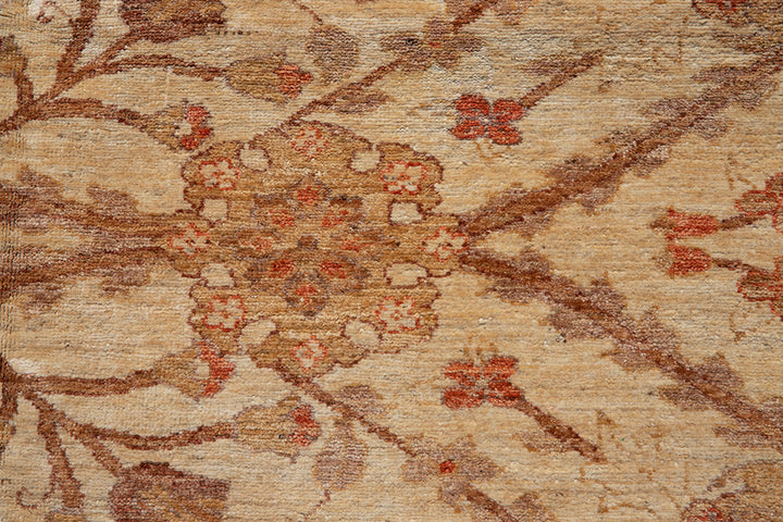 Oversized 14x19 hand-knotted Oushak rug in soft gold and antique tones, featuring floral palmette motifs and crafted from hand-spun Afghan wool by Ariana Rugs.