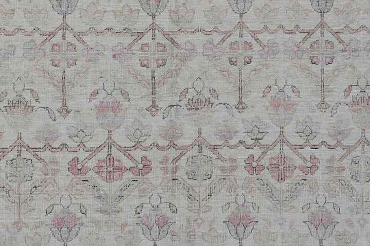 Authentic Ariana Traditional Collection 5x8 wool area rug featuring a traditional overall design pattern in earth tones and soft pink accents, hand-knotted in Afghanistan.