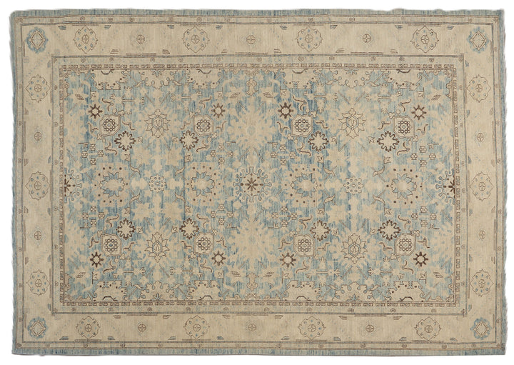 Authentic Ariana Traditional Collection 9x12 wool area rug featuring a classical Sultanabad design on a deep blue background field, hand-knotted in Afghanistan.