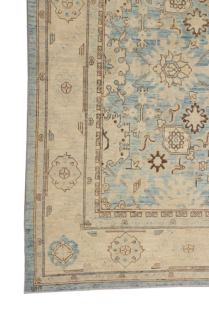Authentic Ariana Traditional Collection 9x12 wool area rug featuring a classical Sultanabad design on a deep blue background field, hand-knotted in Afghanistan.