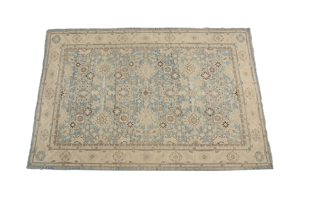 Authentic Ariana Traditional Collection 9x12 wool area rug featuring a classical Sultanabad design on a deep blue background field, hand-knotted in Afghanistan.