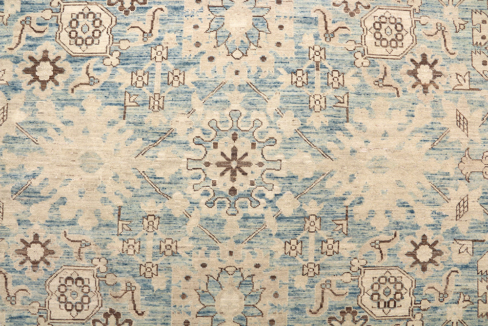 Authentic Ariana Traditional Collection 9x12 wool area rug featuring a classical Sultanabad design on a deep blue background field, hand-knotted in Afghanistan.