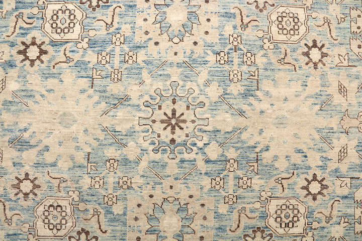 Authentic Ariana Traditional Collection 9x12 wool area rug featuring a classical Sultanabad design on a deep blue background field, hand-knotted in Afghanistan.