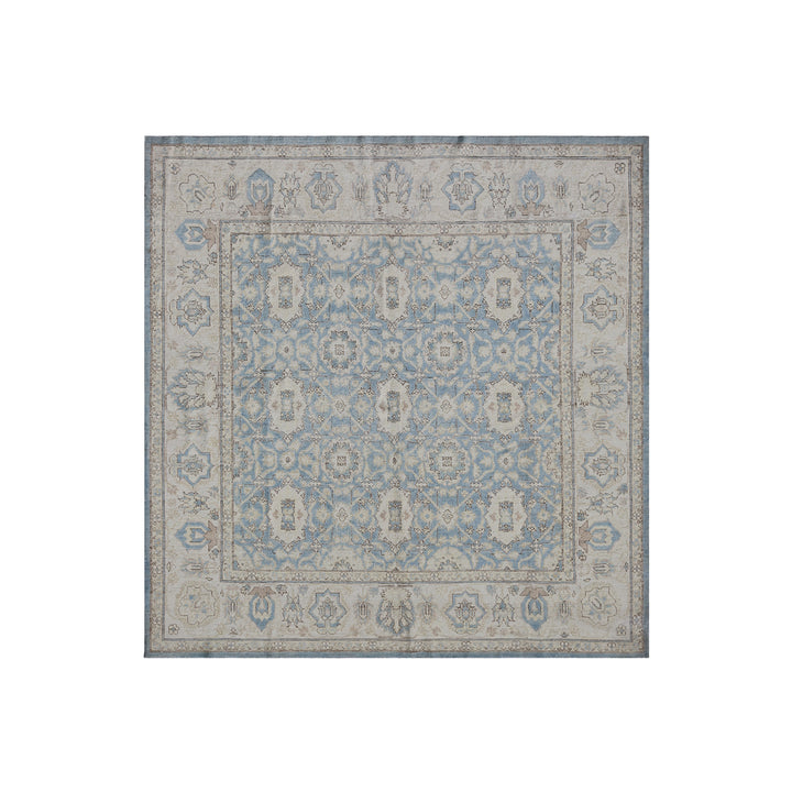 Authentic Ariana Collection 6x6 square wool area rug featuring a transitional geometric Agra design in a soft blue color palette, hand-knotted in Afghanistan.
