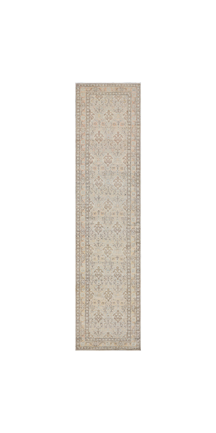 Fine hand-knotted Ariana transitional European design wool runner rug in rich camel, blue, brown, and terracotta tones