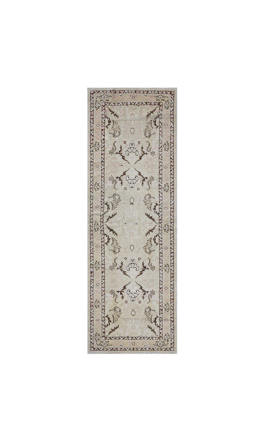 Over-the-shoulder detailed view of an authentic 8'4" x 2'8" Ariana transitional wool hand-knotted runner rug with intricate modern-classic patterns.